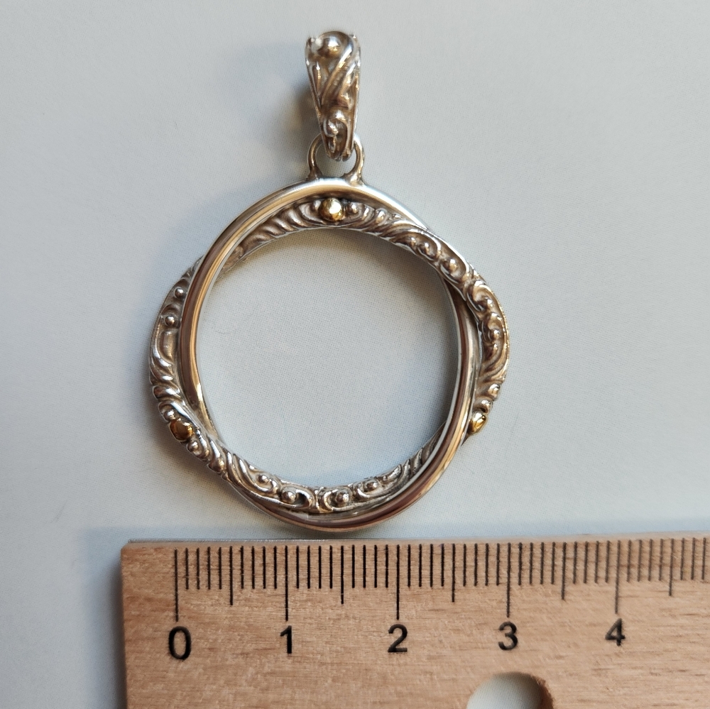Beautiful sterling silver and 14k pendant